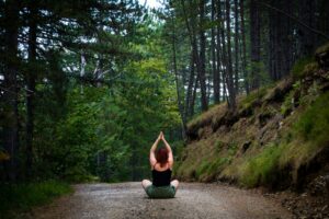 woman practicing yoga for natural hormone balancing